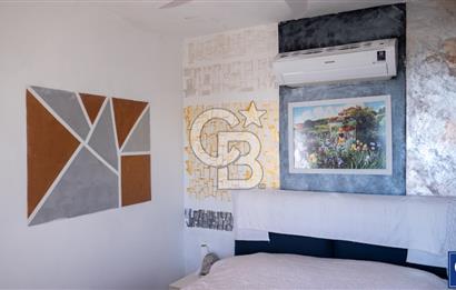 Sarıgerme'de Deniz Manzaralı Kiralık 3+1 Bahçe Tripleksi