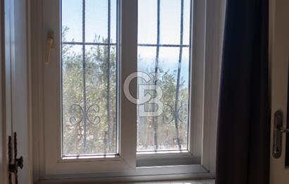 Sarıgerme'de Deniz Manzaralı Kiralık 3+1 Bahçe Tripleksi