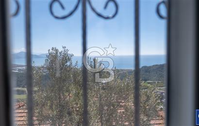 Sarıgerme'de Deniz Manzaralı Kiralık 3+1 Bahçe Tripleksi