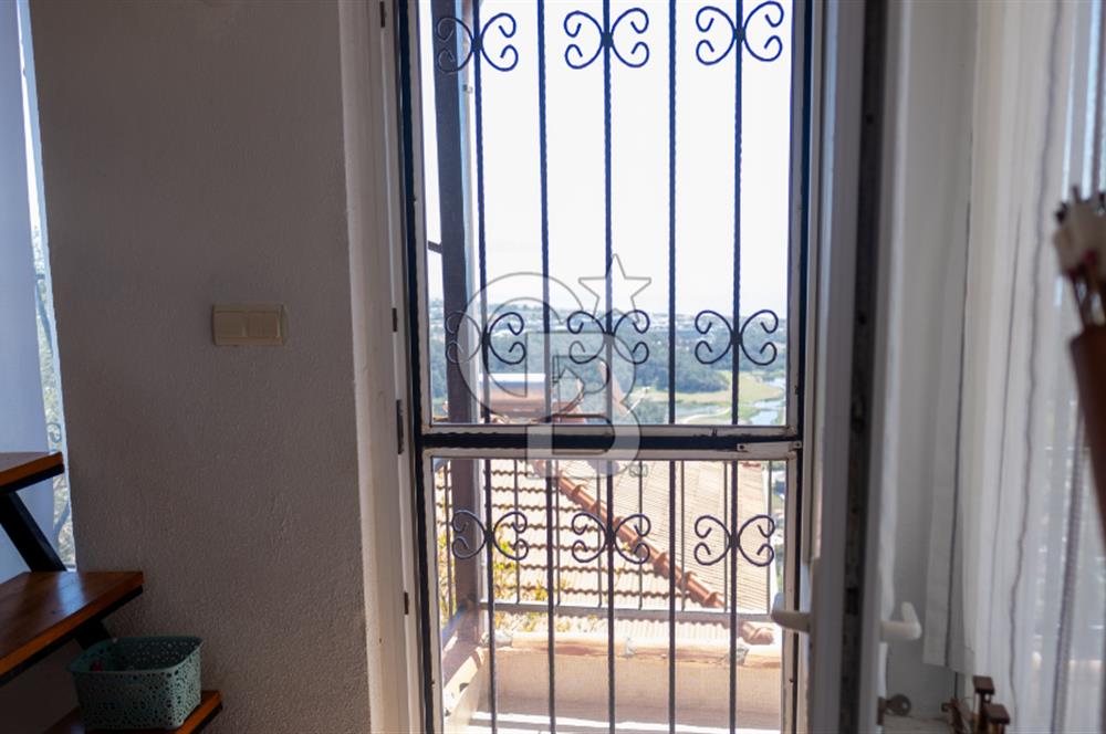 Sarıgerme'de Deniz Manzaralı Kiralık 3+1 Bahçe Tripleksi