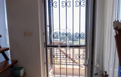 Sarıgerme'de Deniz Manzaralı Kiralık 3+1 Bahçe Tripleksi