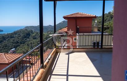 Sarıgerme'de Deniz Manzaralı Kiralık 3+1 Bahçe Tripleksi