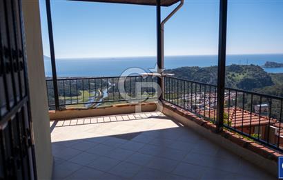 Sarıgerme'de Deniz Manzaralı Kiralık 3+1 Bahçe Tripleksi