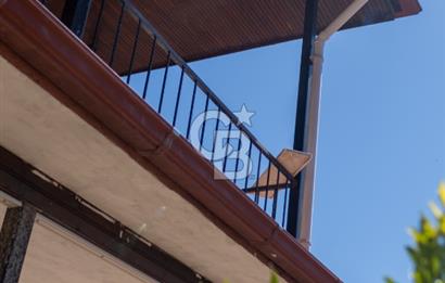 Sarıgerme'de Deniz Manzaralı Kiralık 3+1 Bahçe Tripleksi