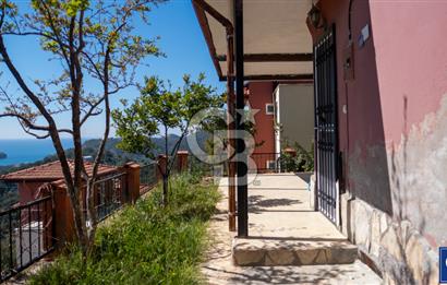 Sarıgerme'de Deniz Manzaralı Kiralık 3+1 Bahçe Tripleksi