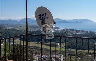 Sarıgerme'de Deniz Manzaralı Kiralık 3+1 Bahçe Tripleksi