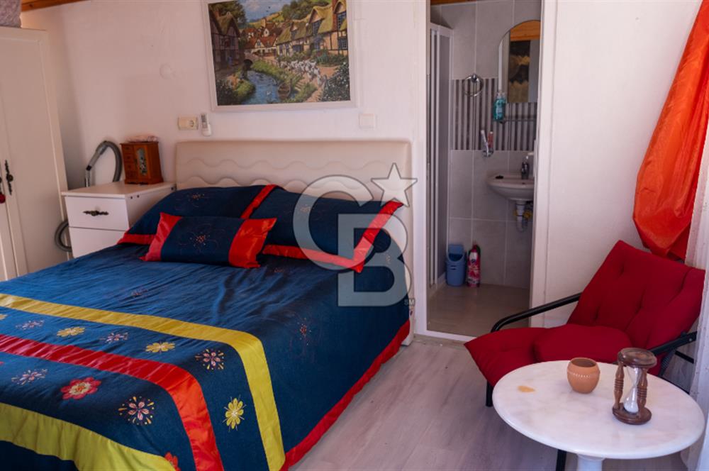 Sarıgerme'de Deniz Manzaralı Kiralık 3+1 Bahçe Tripleksi