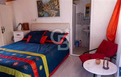 Sarıgerme'de Deniz Manzaralı Kiralık 3+1 Bahçe Tripleksi