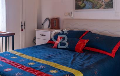 Sarıgerme'de Deniz Manzaralı Kiralık 3+1 Bahçe Tripleksi