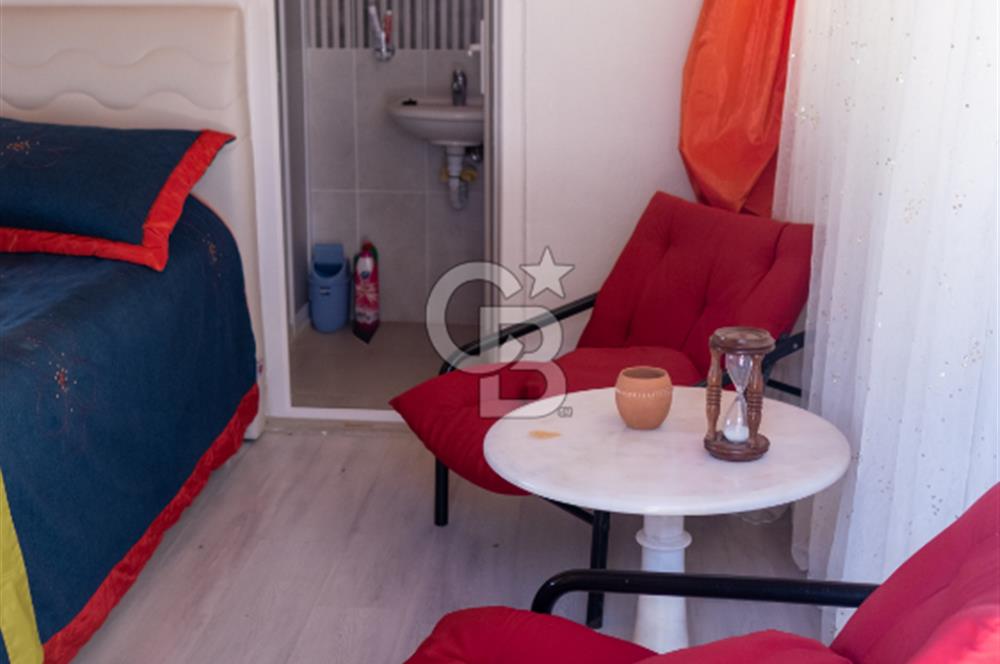 Sarıgerme'de Deniz Manzaralı Kiralık 3+1 Bahçe Tripleksi