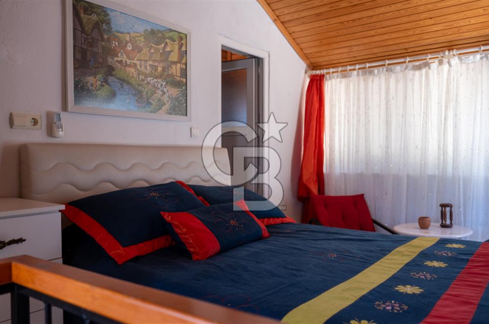 Sarıgerme'de Deniz Manzaralı Kiralık 3+1 Bahçe Tripleksi