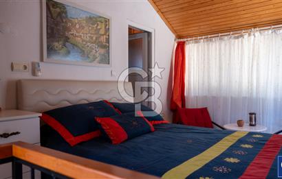 Sarıgerme'de Deniz Manzaralı Kiralık 3+1 Bahçe Tripleksi