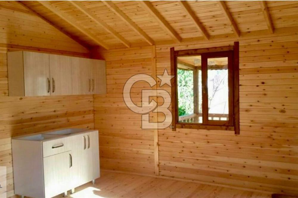 Ortaca Okçular'da Altyapılı Satılık Doğa Manzaralı AHŞAP EVİ OLAN Bahçe 