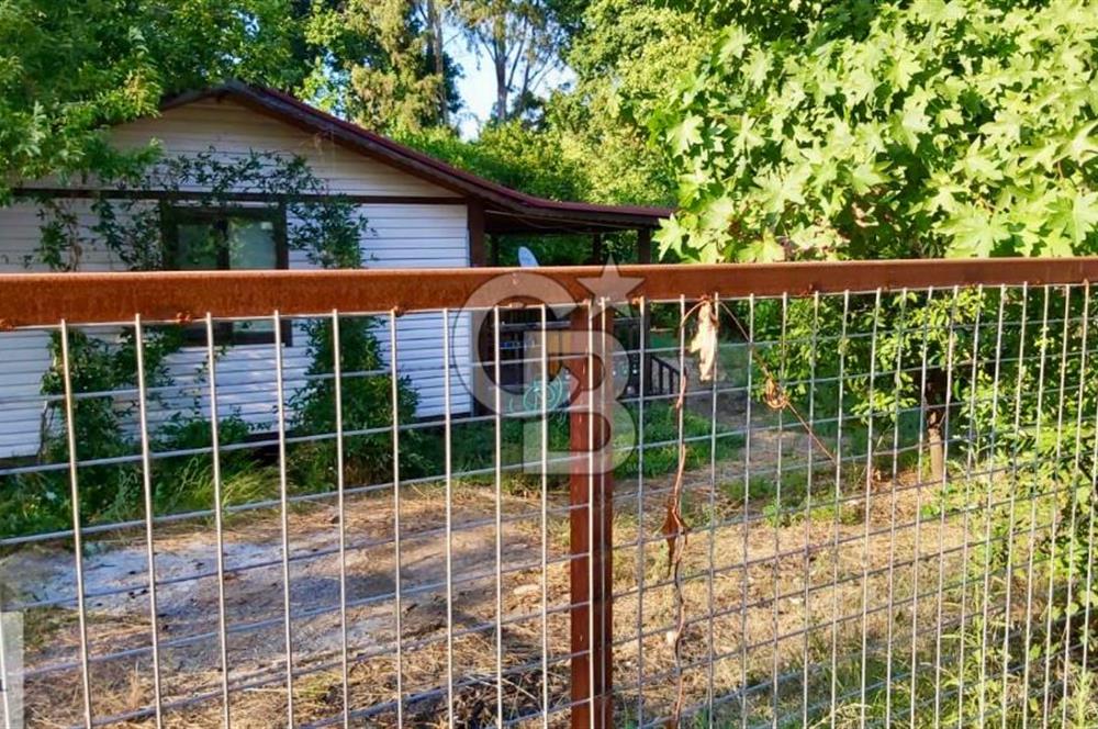 Ortaca Okçular'da Altyapılı Satılık Doğa Manzaralı AHŞAP EVİ OLAN Bahçe 