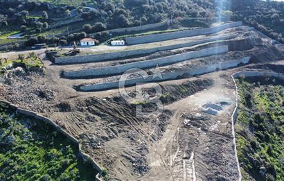 BODRUM GÜRECEDE TERASLAMASI YAPILI DENİZ MANZARALI 255M2 ARSA
