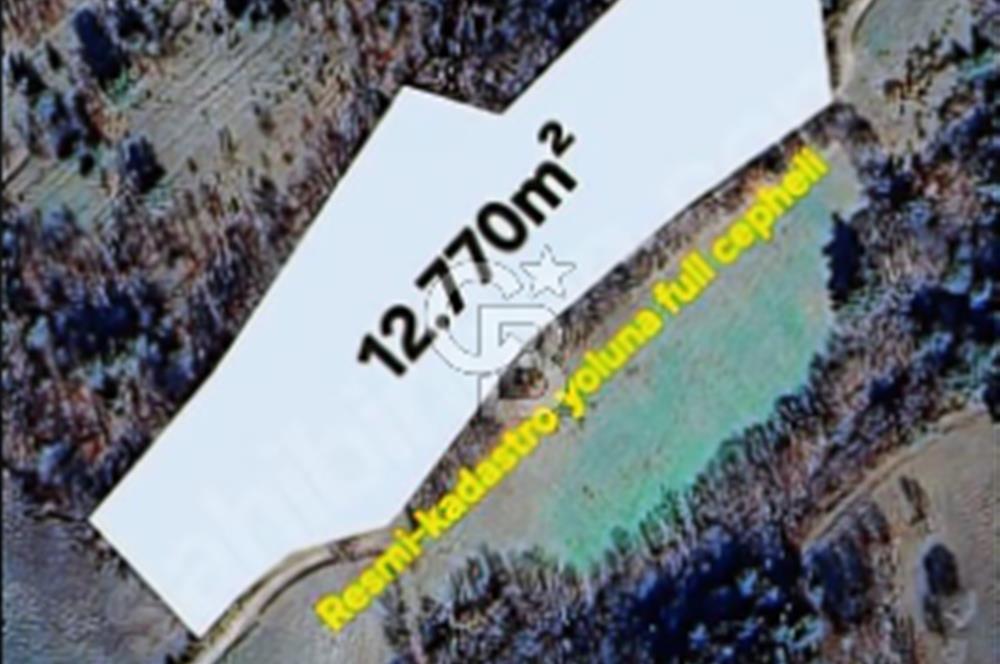 Lapseki/Taştepe'de deniz gören,resmi yolu olan 12.770m² arazi.