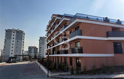TURGUT ÖZAL MAHALLESİNDE SATILIK 1+1 TERASLI DAİRE