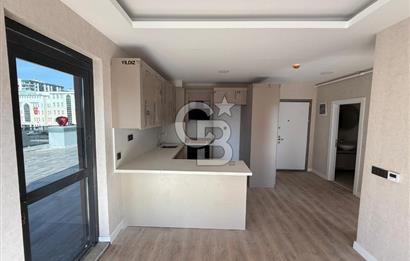 TURGUT ÖZAL MAHALLESİNDE SATILIK 1+1 TERASLI DAİRE