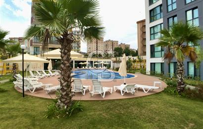KURTKÖY YENİŞEHİR OPTIMUM GARDENS’TA KAPALI MUTFAKLI, BALKONLU GENİŞ 2+1 DAİRE