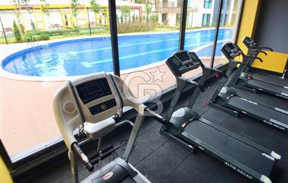 KURTKÖY YENİŞEHİR OPTIMUM GARDENS’TA KAPALI MUTFAKLI, BALKONLU GENİŞ 2+1 DAİRE