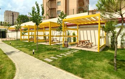 KURTKÖY YENİŞEHİR OPTIMUM GARDENS’TA KAPALI MUTFAKLI, BALKONLU GENİŞ 2+1 DAİRE