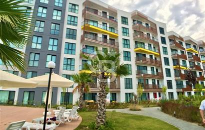 KURTKÖY YENİŞEHİR OPTIMUM GARDENS’TA KAPALI MUTFAKLI, BALKONLU GENİŞ 2+1 DAİRE