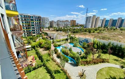 KURTKÖY YENİŞEHİR OPTIMUM GARDENS’TA KAPALI MUTFAKLI, BALKONLU GENİŞ 2+1 DAİRE