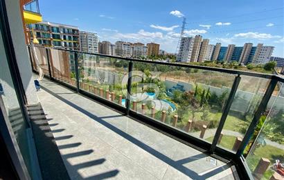 KURTKÖY YENİŞEHİR OPTIMUM GARDENS’TA KAPALI MUTFAKLI, BALKONLU GENİŞ 2+1 DAİRE