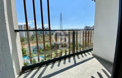 KURTKÖY YENİŞEHİR OPTIMUM GARDENS’TA KAPALI MUTFAKLI, BALKONLU GENİŞ 2+1 DAİRE