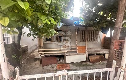 Bayraklı Adalet’te 4 Kat İmarlı, Üzerinde Kâgir Ev Bulunan Yatırım Fırsatı
