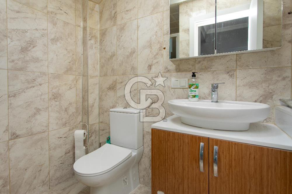 Foça Yenibağarası Mah. Satılık 2+1 Bahçe Katı Daire