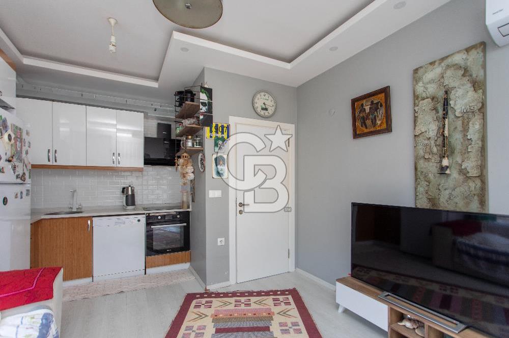 Foça Yenibağarası Mah. Satılık 2+1 Bahçe Katı Daire