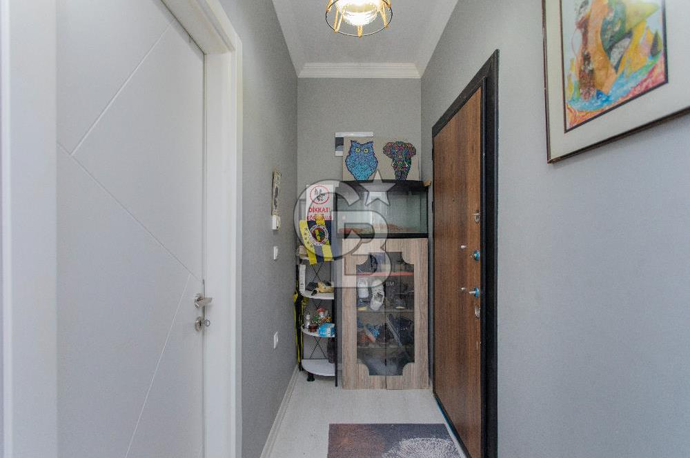 Foça Yenibağarası Mah. Satılık 2+1 Bahçe Katı Daire