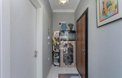 Foça Yenibağarası Mah. Satılık 2+1 Bahçe Katı Daire
