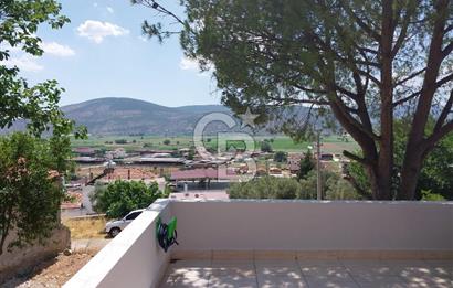 Muğla Milas içme köyü 1055 m2 içinde satılık köy evi ve bahçesi 