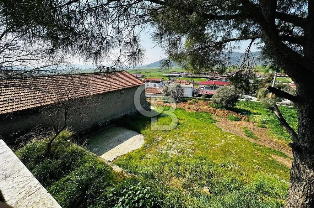Muğla Milas içme köyü 1055 m2 içinde satılık köy evi ve bahçesi 
