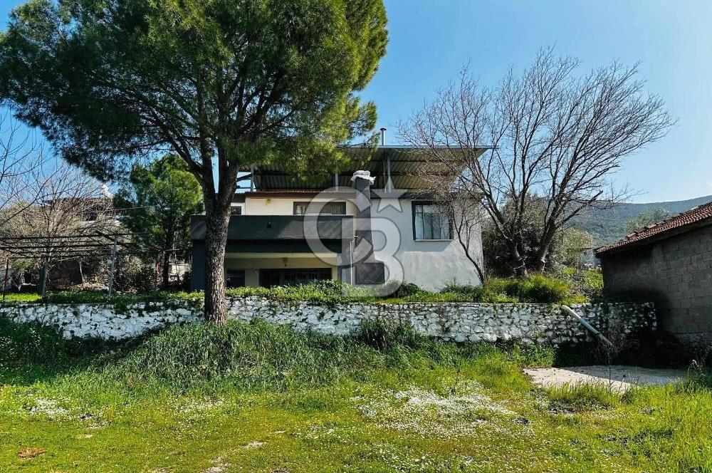 Muğla Milas içme köyü 1055 m2 içinde satılık köy evi ve bahçesi 