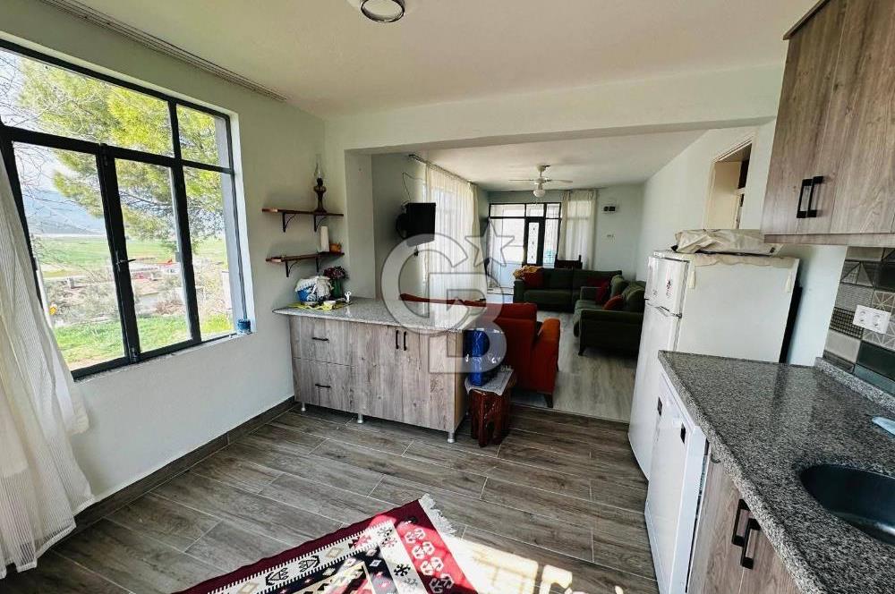 Muğla Milas içme köyü 1055 m2 içinde satılık köy evi ve bahçesi 