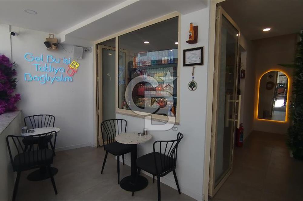 Bostanlı Merkez'de Devirli Kiralık Dükkan 