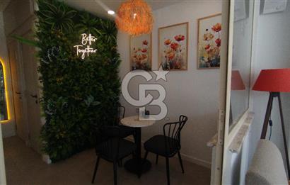 Bostanlı Merkez'de Devirli Kiralık Dükkan 