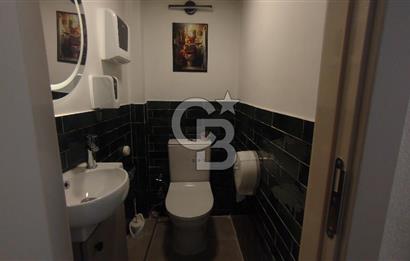 Bostanlı Merkez'de Devirli Kiralık Dükkan 