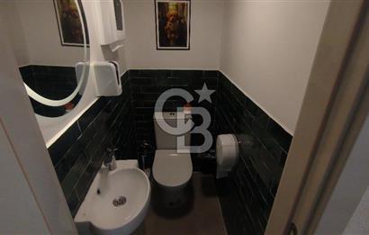 Bostanlı Merkez'de Devirli Kiralık Dükkan 
