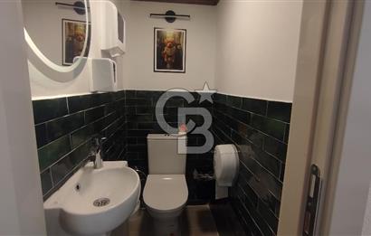 Bostanlı Merkez'de Devirli Kiralık Dükkan 