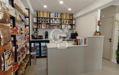 Bostanlı Merkez'de Devirli Kiralık Dükkan 