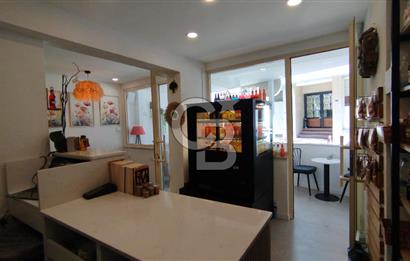 Bostanlı Merkez'de Devirli Kiralık Dükkan 