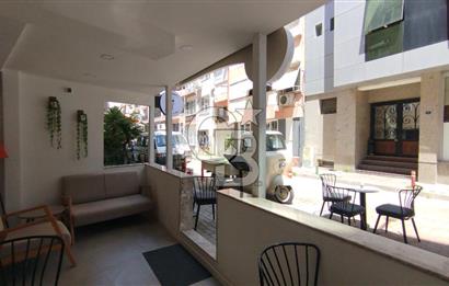 Bostanlı Merkez'de Devirli Kiralık Dükkan 