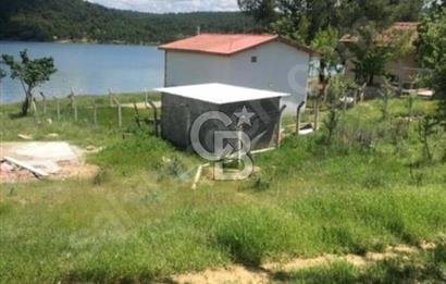 TAYİN NEDENİYLE ACİL UYGUN FİYAT'LA İMARLI GÖL MANZARALI ARSA
