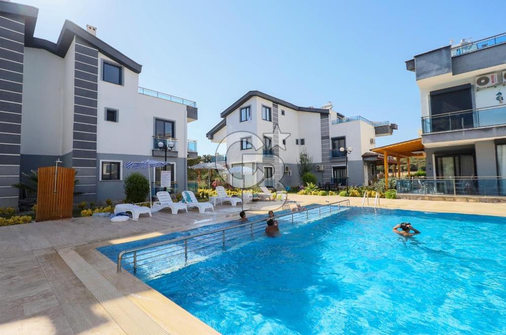 Didim Hisar Mahellesinde  Havuzlu Sitede Satılık 3+1 Villa 