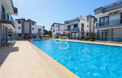 Didim Hisar Mahellesinde  Havuzlu Sitede Satılık 3+1 Villa 