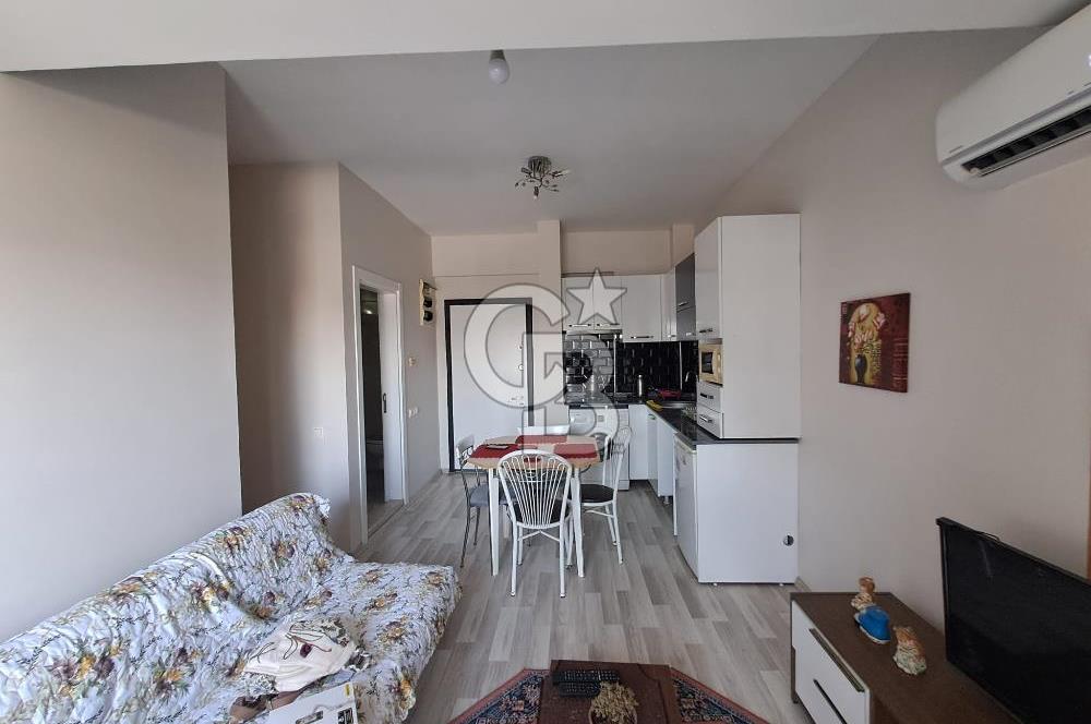 Seyrek'te Havuzlu ve Yeşillikli Site Eşyalı Kiralık 1+1